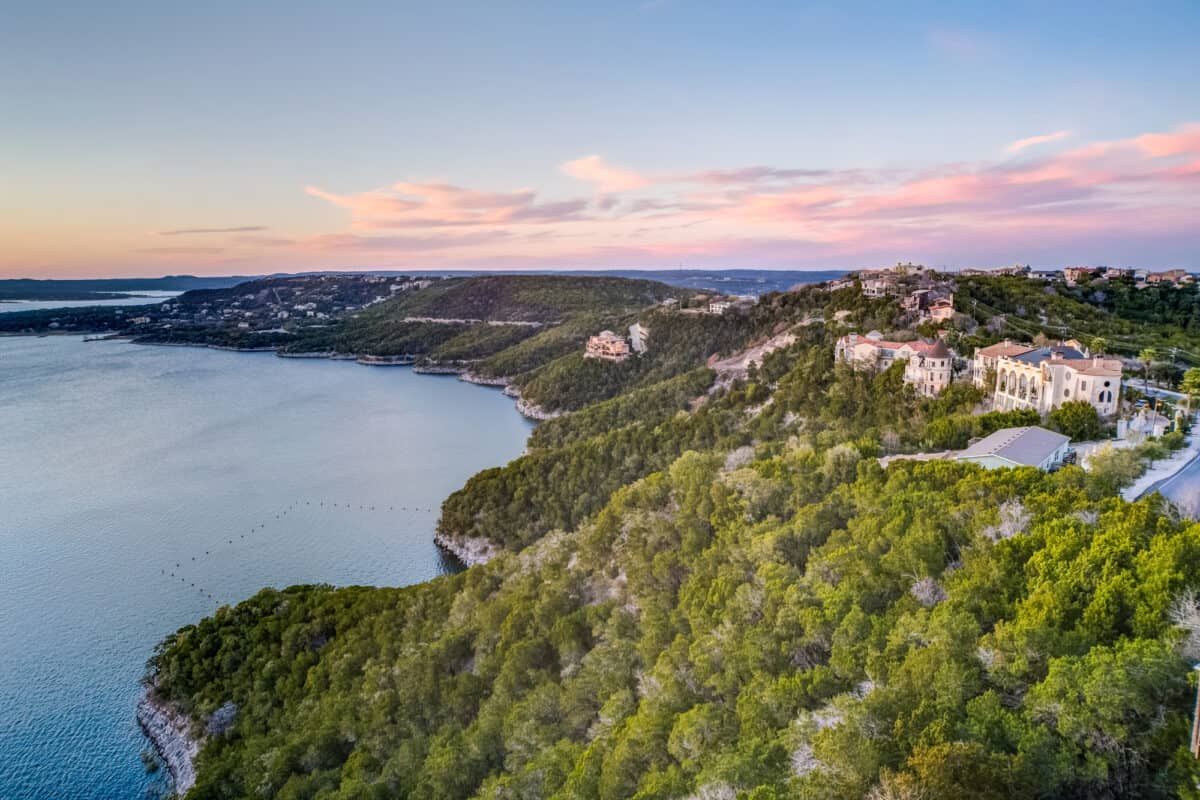 Exquisite waterfront homes grace the shores of Lake Travis in Austin, Texas, embodying luxury and elegance